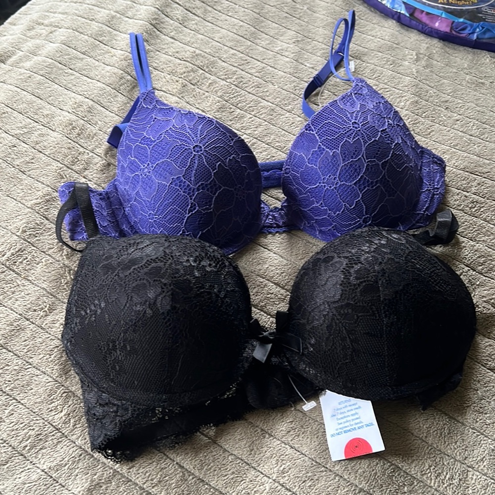 Two new bras purple one is Calvin Kline